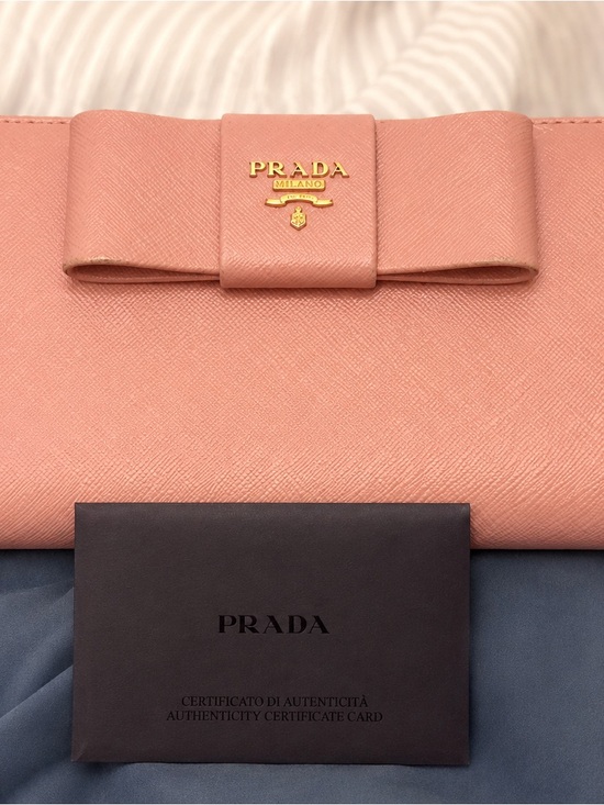 Prada Handbags - Prada Pink Bow Saffiano Leather Wallet with Gold Logo